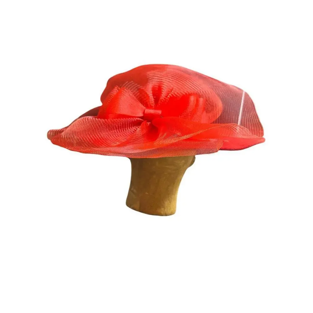 red wool wide brim hat dating to the glamorous 1980s. It has a low rounded crown